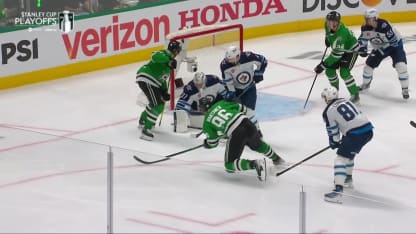 Players battle for the puck in the golden knights vs oilers matchup