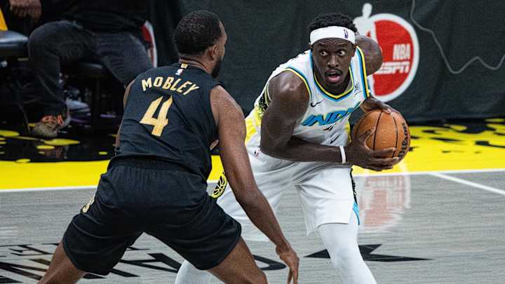 Obi Toppin rises for a slam dunk during the NBA Playoffs