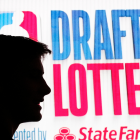 Excited NBA fans watching lottery results