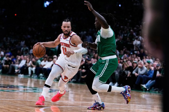 Jalen Brunson with his wife and family after a Knicks victory