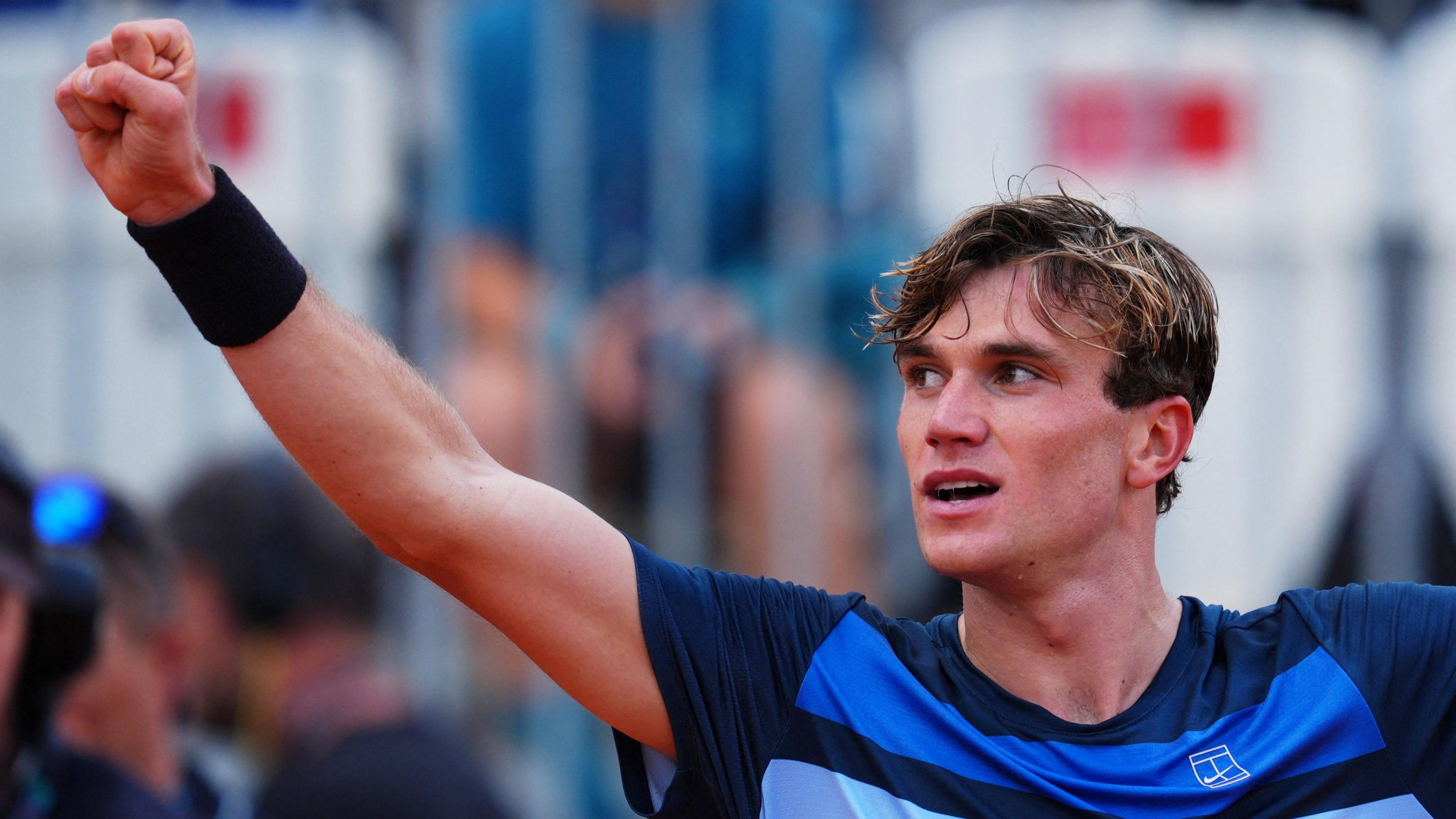 Jack Draper stretches for a forehand during the Italian Open in Rome.