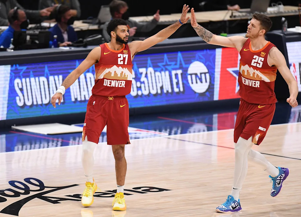 Nikola Jokic looking for a play during a Denver Nuggets game