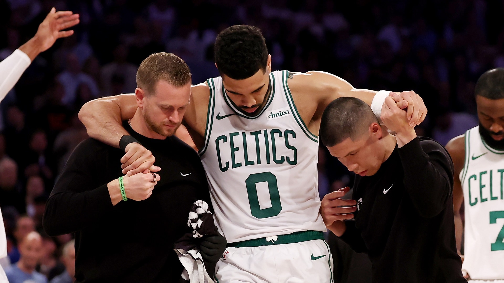 Professional basketball player suffering a ruptured Achilles