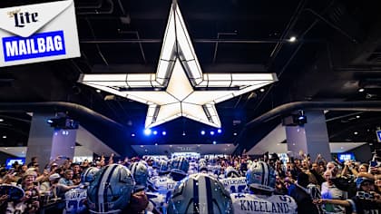 Fans cheering at AT&T Stadium for Dallas Cowboys tickets