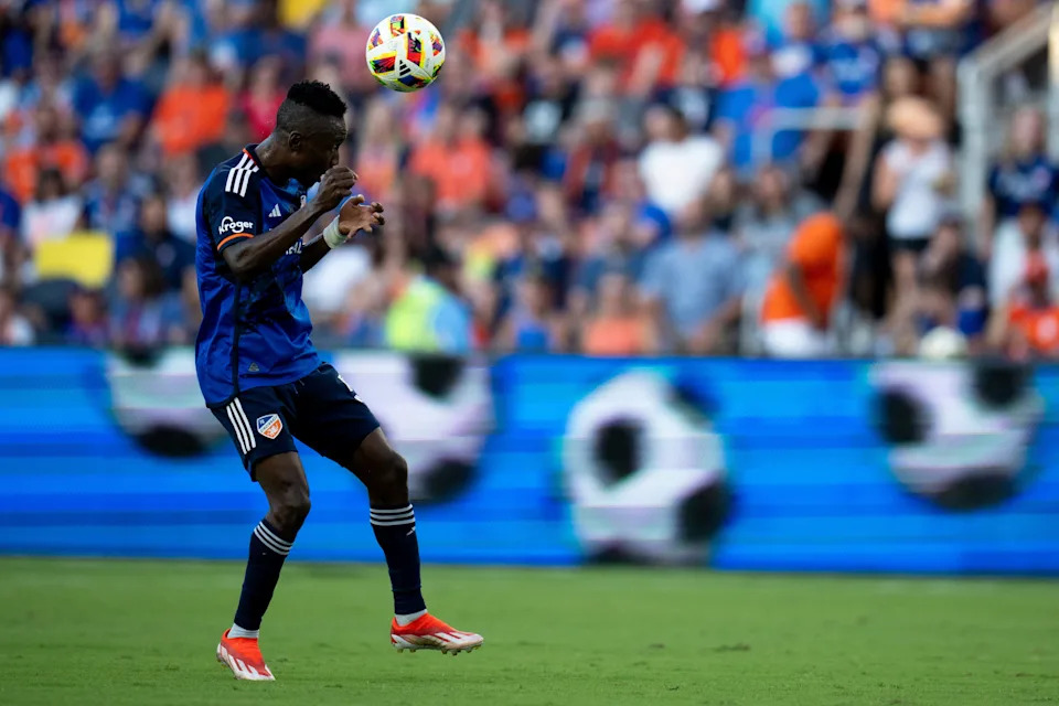 FC Cincinnati midfielder Obinna Nwobodo celebrates with teammates