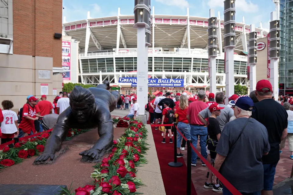 Cincinnati Reds fans celebrate recent news.