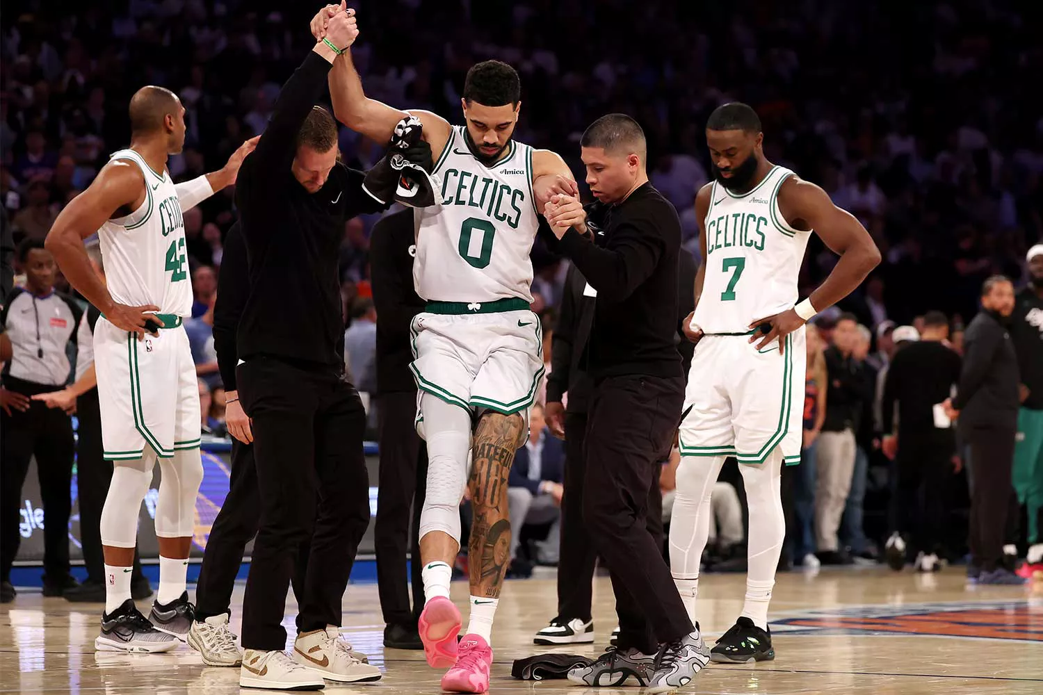 The Knicks defeating the Celtics in dramatic playoff action.