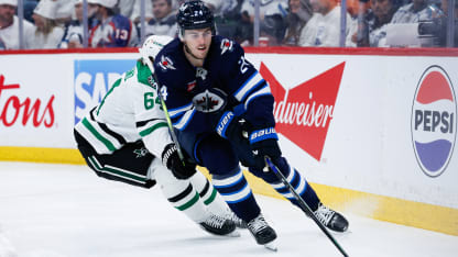 Dallas Stars players celebrating a victory in stars game action