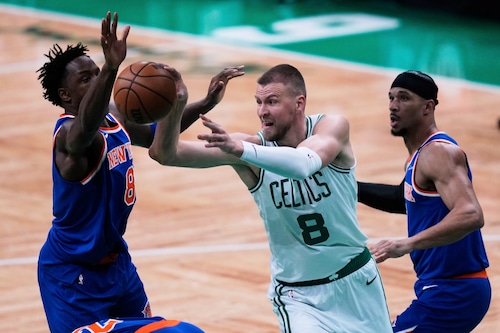 Boston Celtics coach discussing strategy during the playoffs