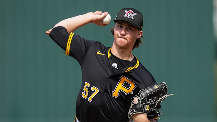 Hunter Dobbins pitching, showing his strong form and prospect potential.