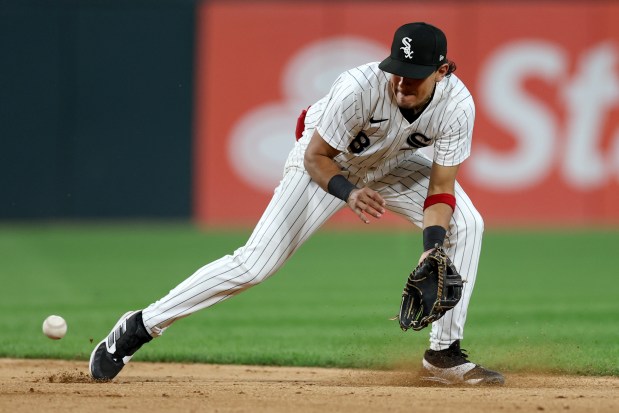 White Sox player fielding a ground ball during the Crosstown Classic