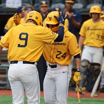 WVU baseball players celebrate during a historic season