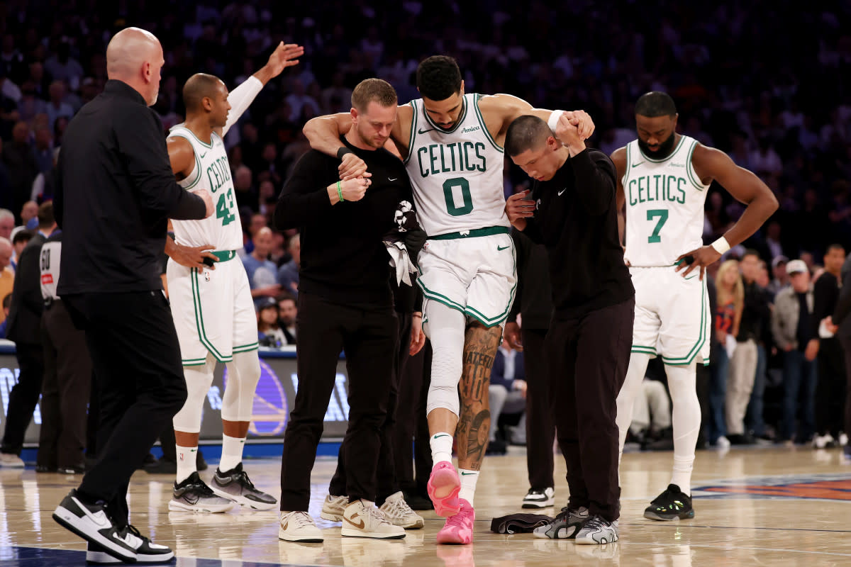 Kevin Garnett celebrates on the court, exemplifying his legendary intensity