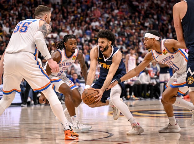 Cason Wallace defending in an NBA playoff game