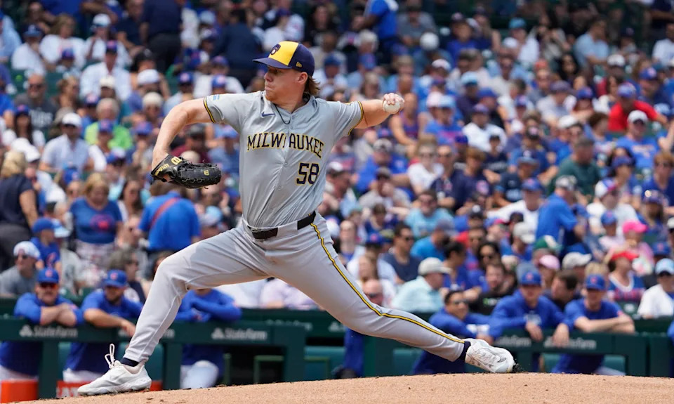 Rob Zastryzny enters the Milwaukee Brewers clubhouse, ready for another stint in the bullpen.