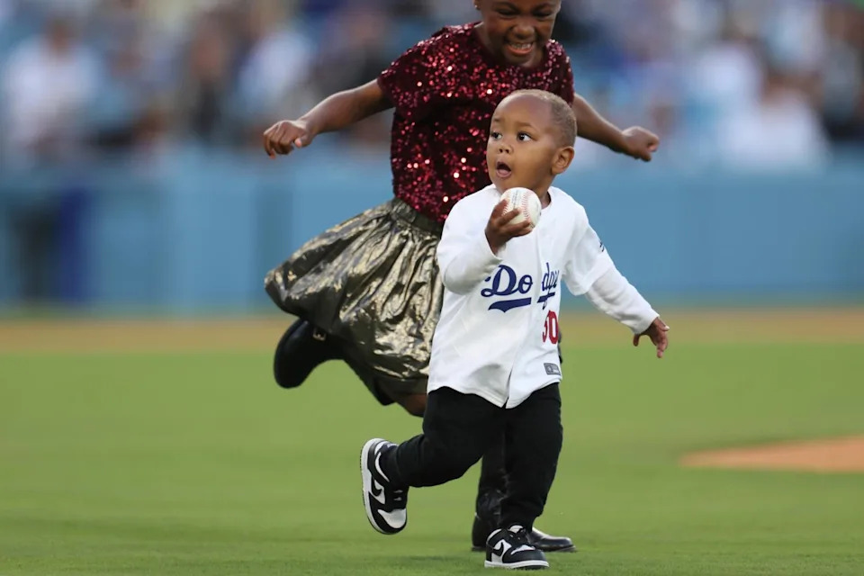 Mookie Betts and son Kaj share a memorable baseball moment at Dodger Stadium