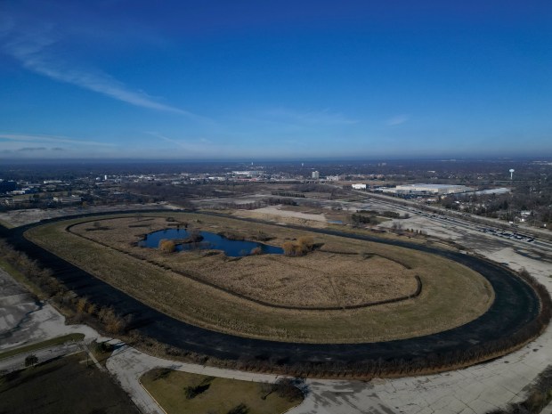 A digital billboard advertising the Chicago Bears sits near the practice track of the former Arlington International Racetrack in Arlington Heights.