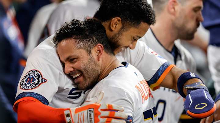 Jose Altuve and teammates celebrate after a big win for the Houston Astros