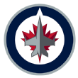 Toronto Maple Leafs players regroup during a crucial NHL playoff game, symbolizing the Leafs' determination.