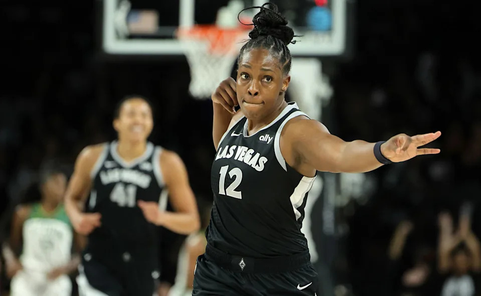 Chelsea Gray preparing for a WNBA game, highlighting her leadership on the court
