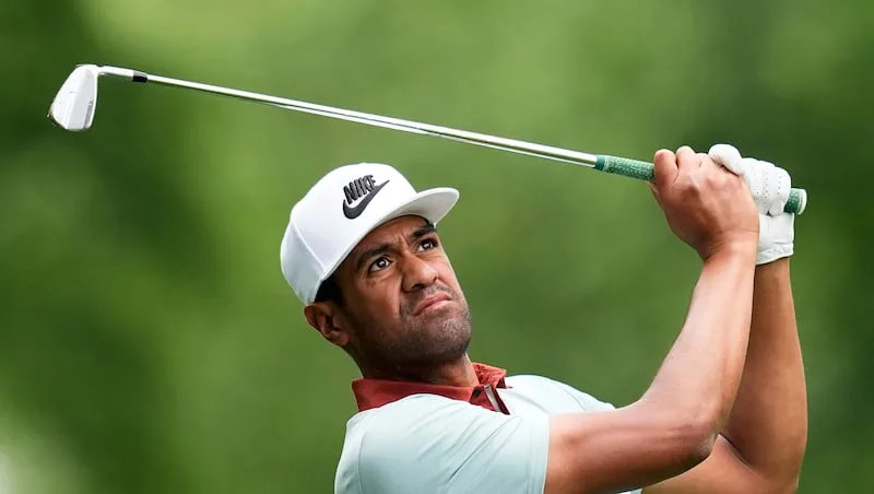 Tony Finau studies the green during the 2025 PGA Championship