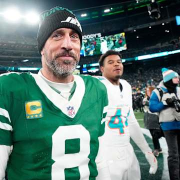 Chris Olave making a reception during an NFL game