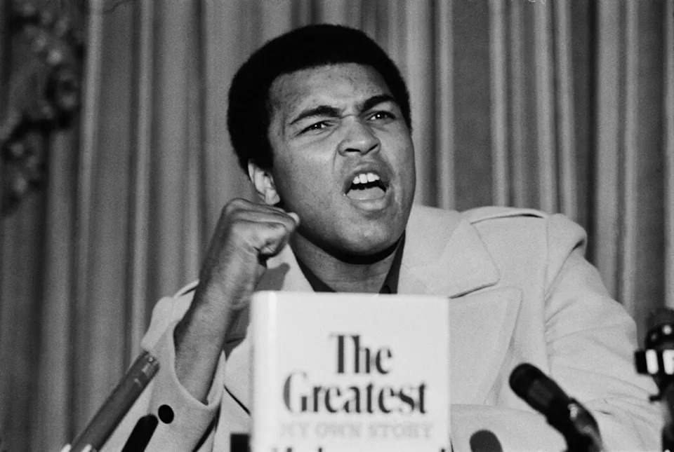 Muhammad Ali triumphant in the ring, representing strength and legacy