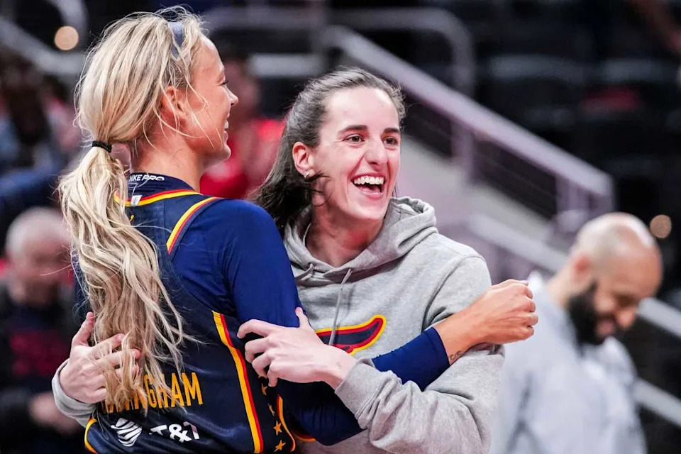 Indiana Fever celebrate a key moment during their WNBA game.