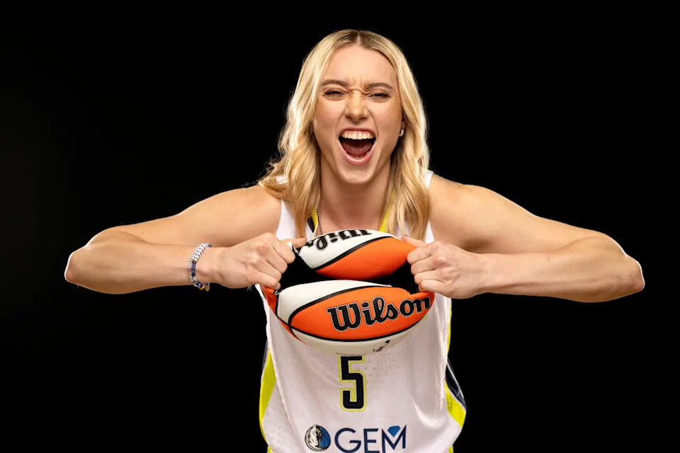 Arike Ogunbowale celebrates on court for the Dallas Wings