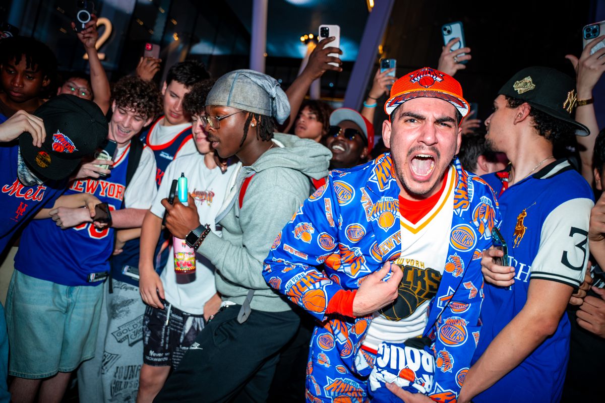 Knicks players celebrate their playoff victory at Madison Square Garden