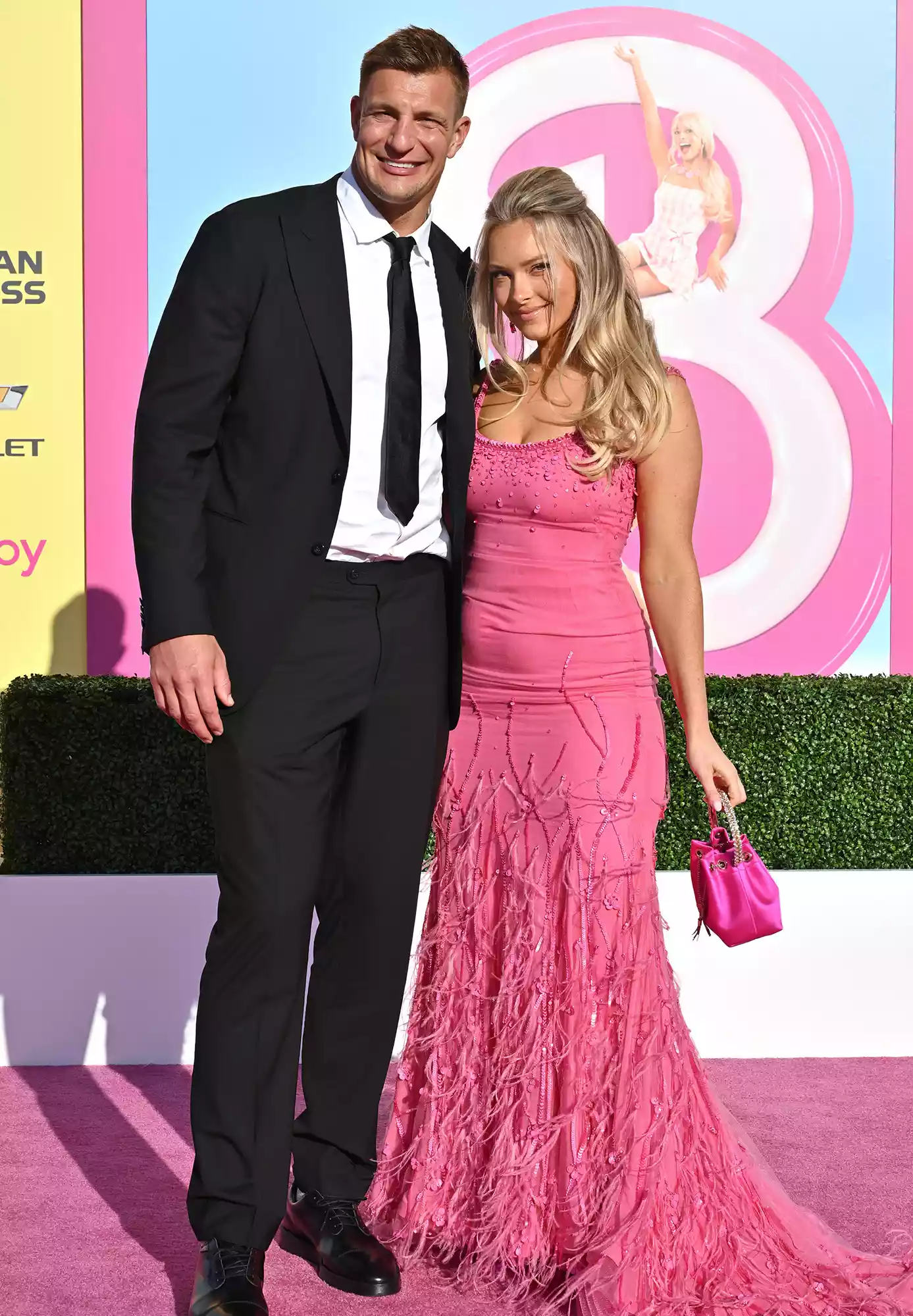 Camille Kostek attending a Sports Illustrated event with Rob Gronkowski