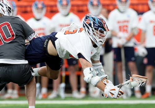 Cornell lacrosse players in action during NCAA tournament game
