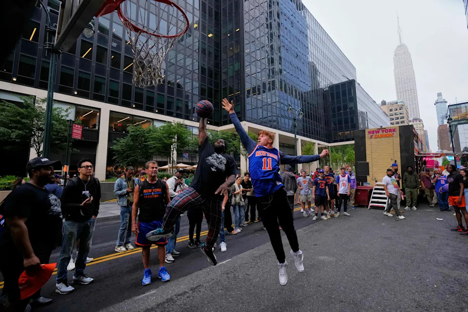 Knicks fans gathering at Madison Square Garden during playoffs