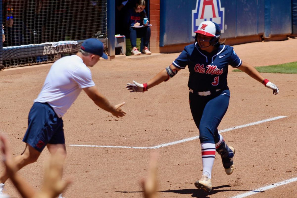 Arizona softball player in action during Tucson Regional
