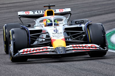 Isack Hadjar competing in his Formula 1 car
