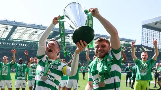 Celtic FC players celebrate Premiership victory