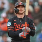 Orioles players during a recent MLB game, reflecting on recent team changes.