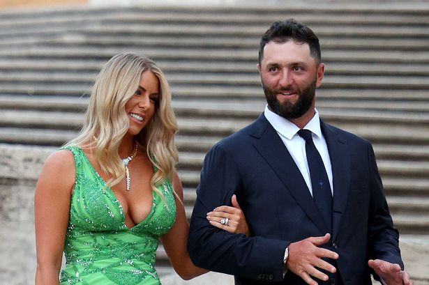 Jon Rahm and wife Kelley Cahill at a tournament event.