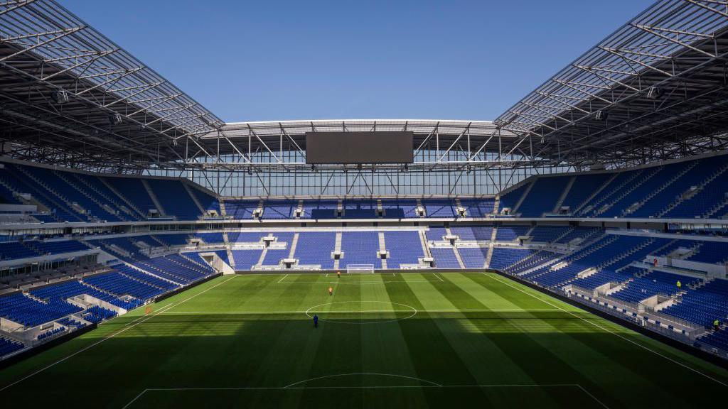 A panoramic view of the Everton new stadium construction at Bramley-Moore Dock, showcasing the future Hill Dickinson Stadium.
