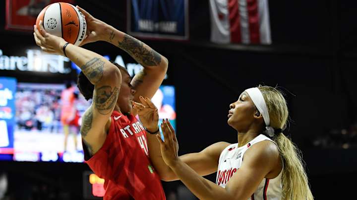 Kiki Iriafen celebrates her pro debut with the Mystics
