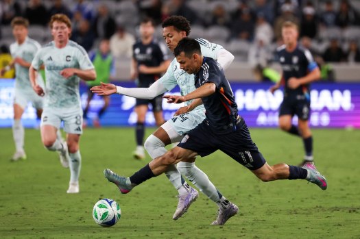 San Diego FC player controlling the ball at Snapdragon Stadium, highlighting sdfc action