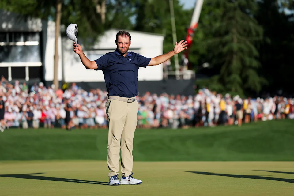 Scottie Scheffler with his caddie at the 2025 PGA Championship