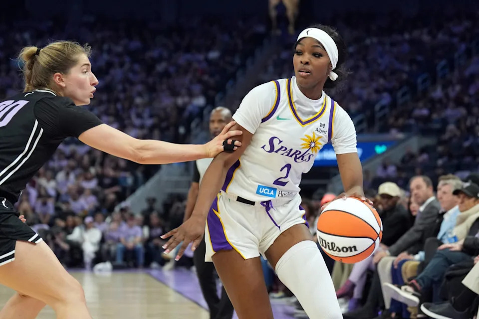 Rickea Jackson poses confidently before an LA Sparks game, highlighting her unique style and growing influence in the WNBA