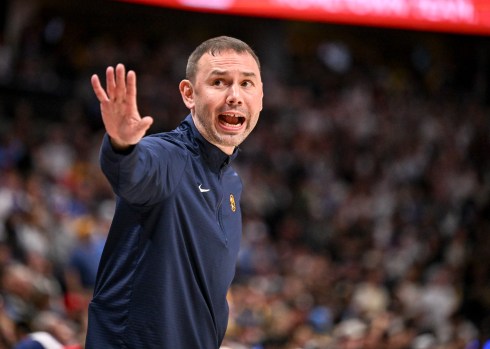 David Adelman coaching the Denver Nuggets