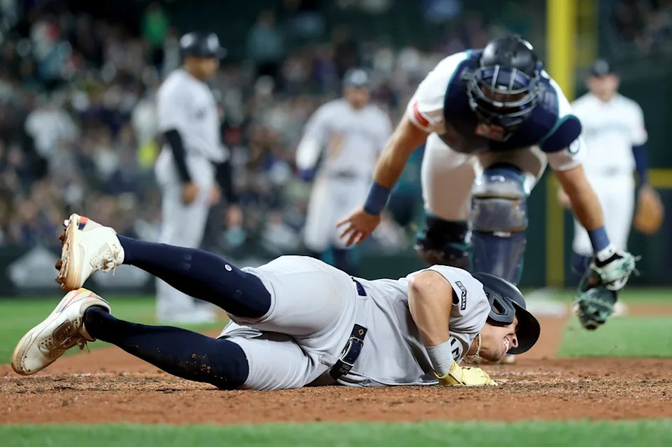 Anthony Volpe drives a ball during a Yankees game