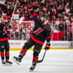 A thrilling Florida Panthers goal during the Stanley Cup Playoffs. Panthers score as fans cheer in the arena.