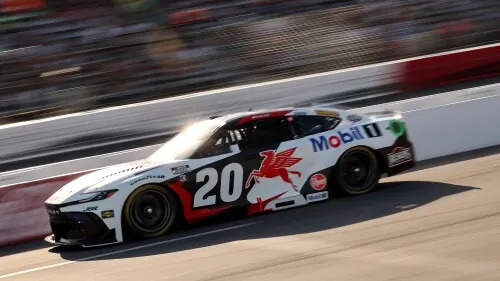 NASCAR All-Star Race cars lined up on track