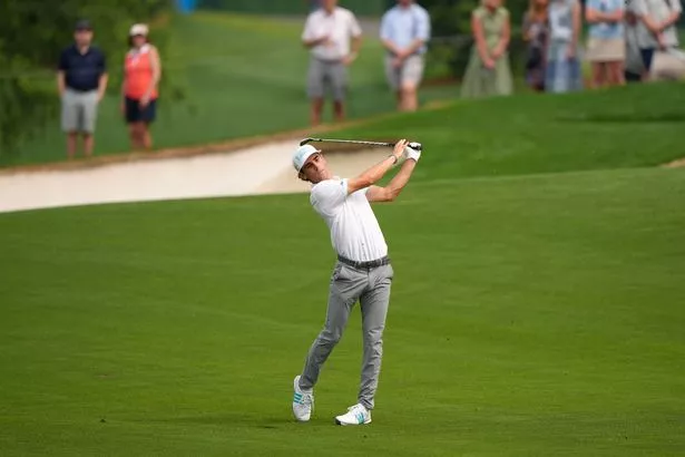 Joaquin Niemann celebrates a tournament win — a symbol of his growing impact in golf