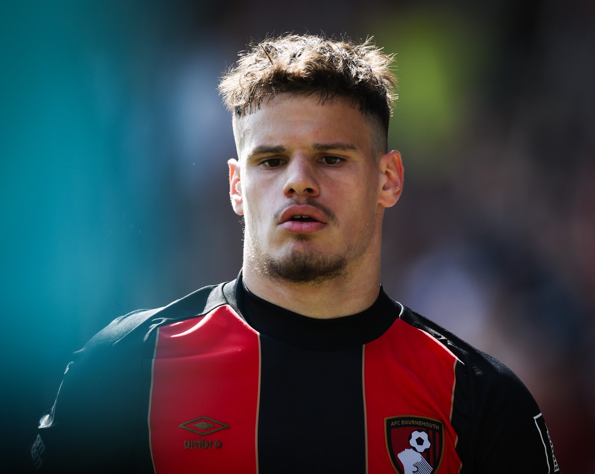 Milos Kerkez in action for Bournemouth against Aston Villa, a rising star linked to Liverpool