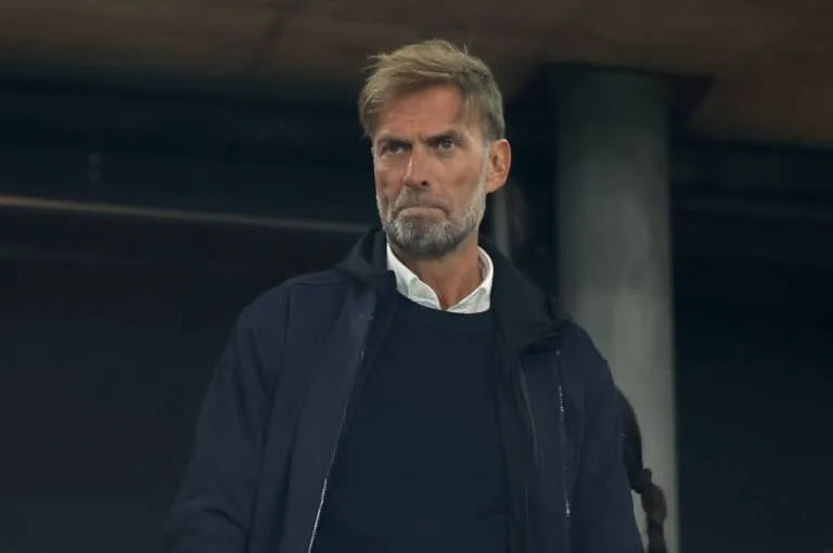 Jurgen Klopp at a press conference, potentially AS Roma-bound
